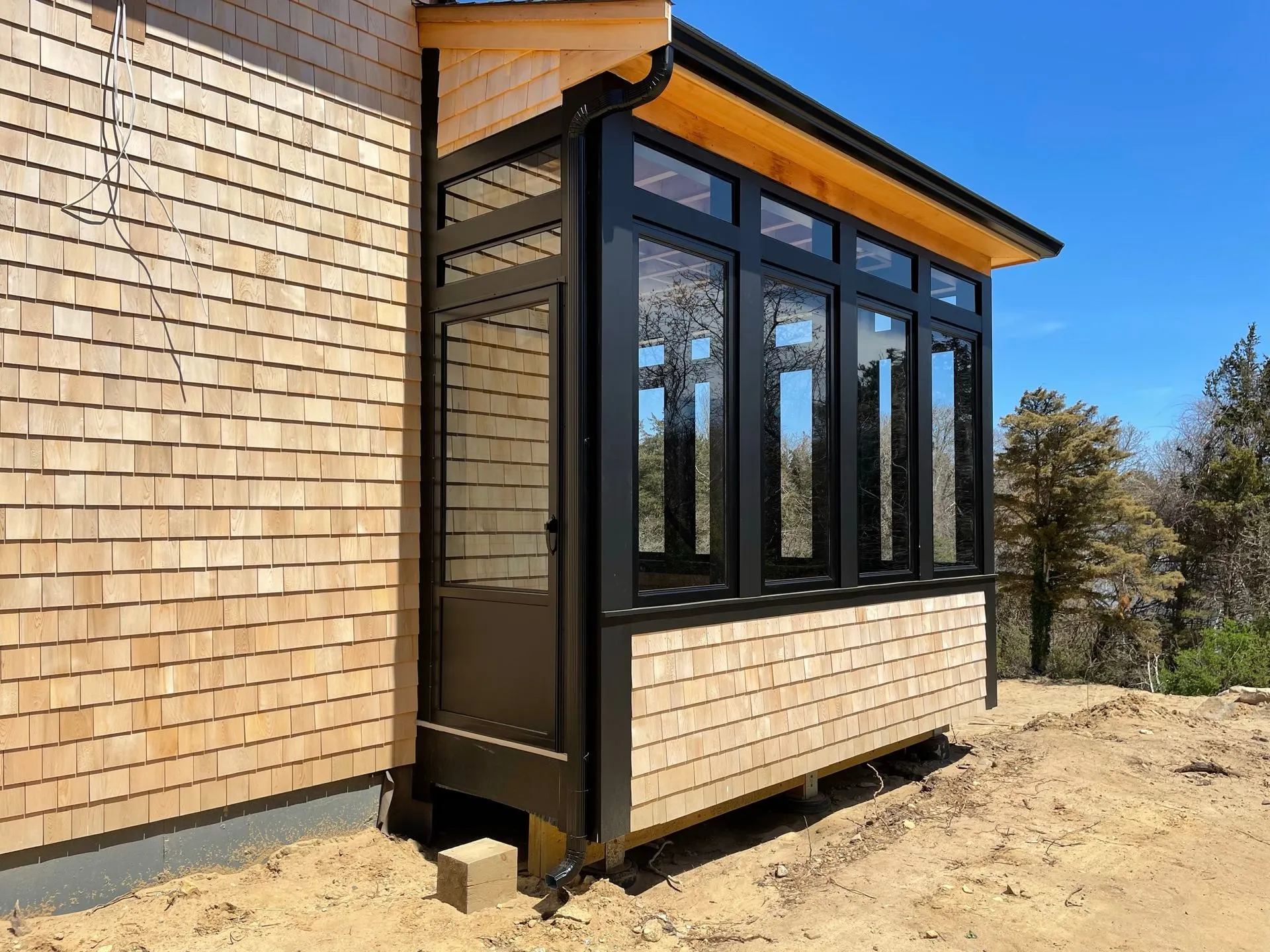 a house with a large window on the side of it