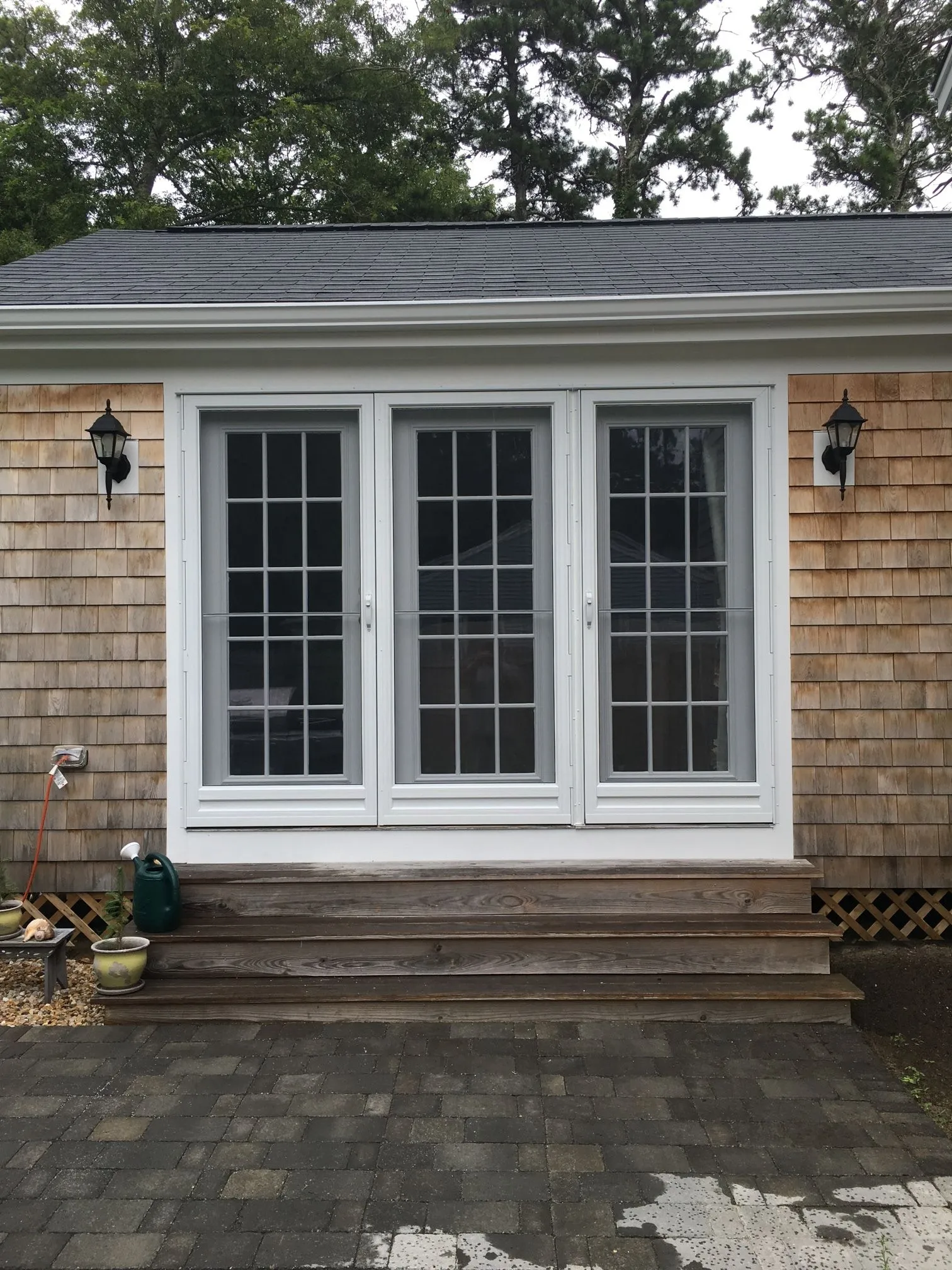 a house with a lot of windows and stairs