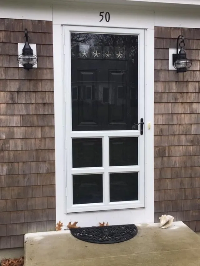 a white screen door with the number 50 on it